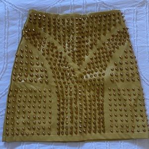 Yellow gold stud mini skirt